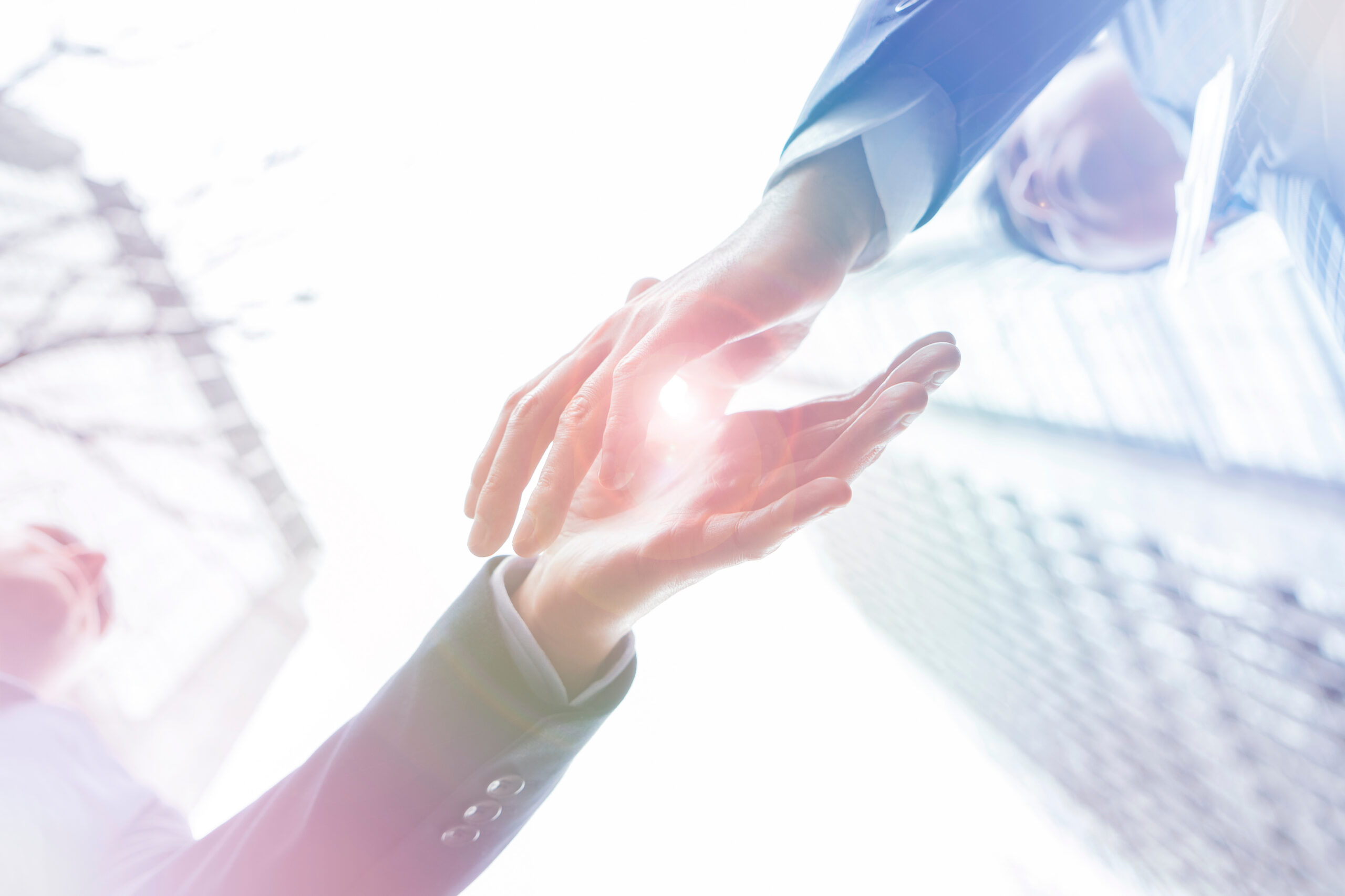 customer acquisition strategies shown by shaking hands